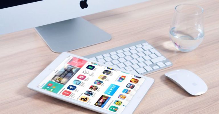 Applications - White Tablet Computer on Apple Magic Keyboard Near Apple Magic Mouse