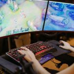 Gaming Monitors - A Woman Playing League of Legends