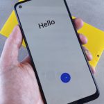 Touchscreen Sensitivity - A person holding a smartphone with the word hello on it