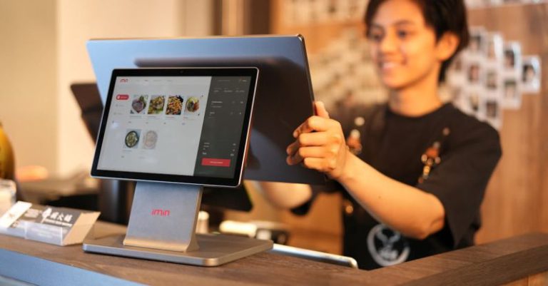 Touchscreens - Cashier Using Touchscreen