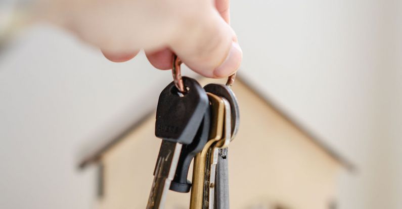 Key Features - Person with keys for real estate