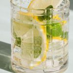 Refresh Rates - Glass of fresh drink on white background