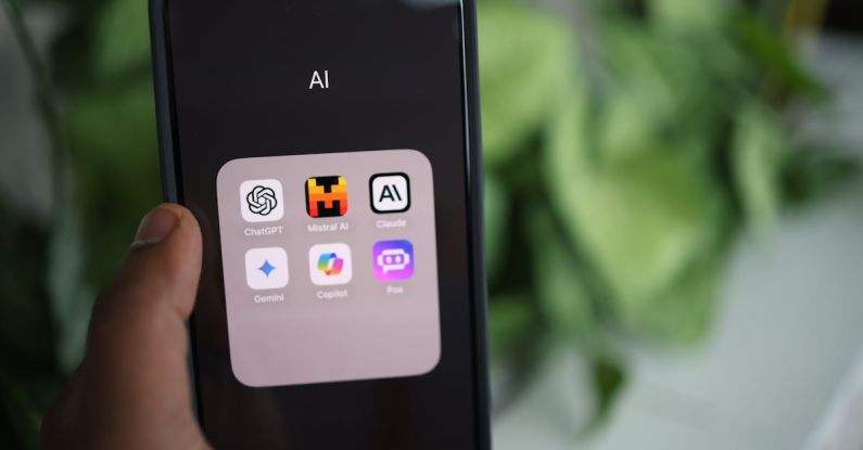 Future Applications - A person holding an iphone with the app icons on it