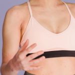 Short Throw Projectors - Smiling woman exercising with fit ball