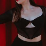 Color Calibration - Woman Posing in Front of Red Curtain